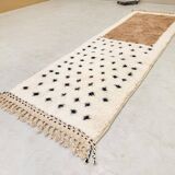 Moroccan polka dot hallway, white and brown beni ourain rug, berber design