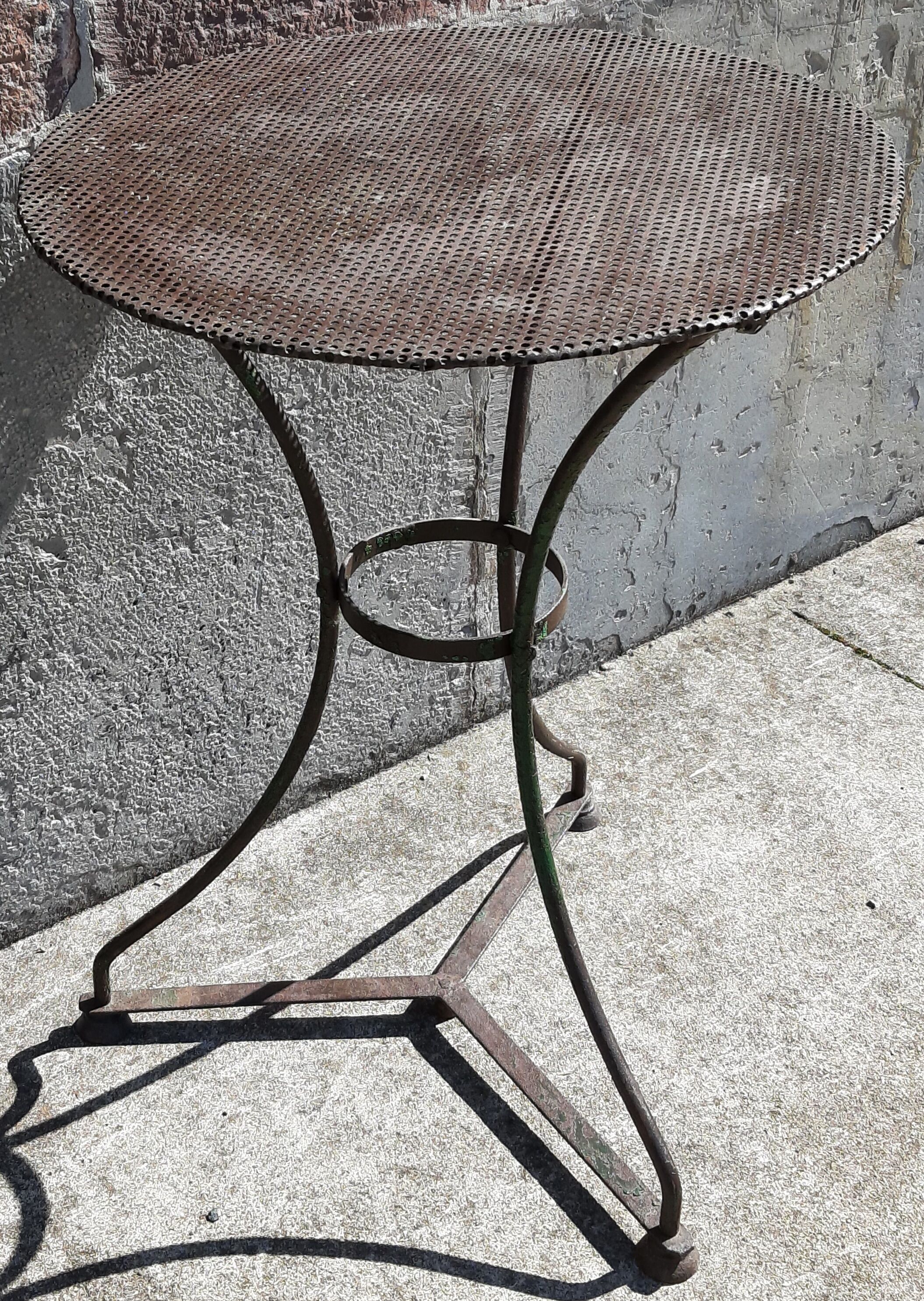Wrought iron pedestal table