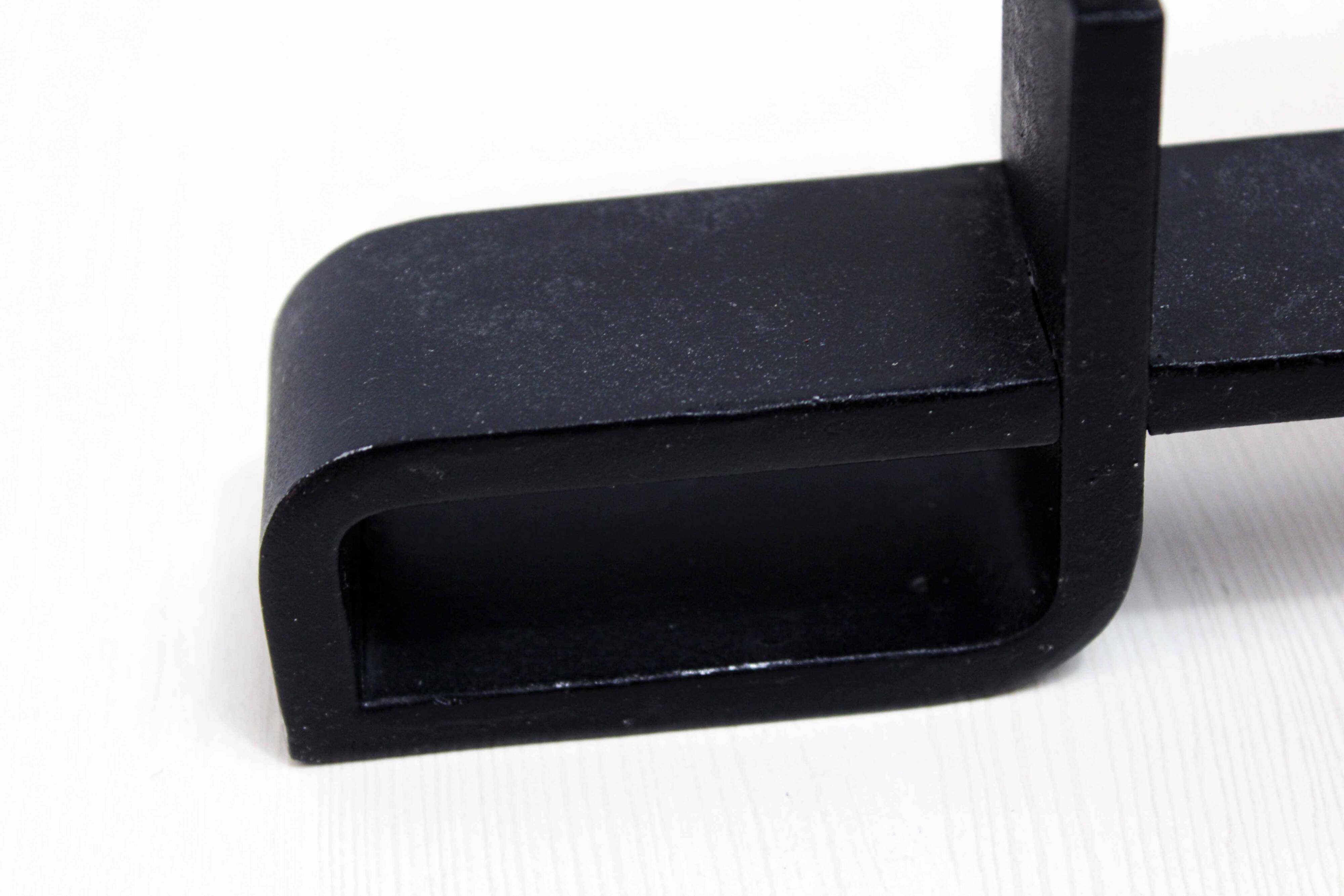 Modernist cast iron candle holder