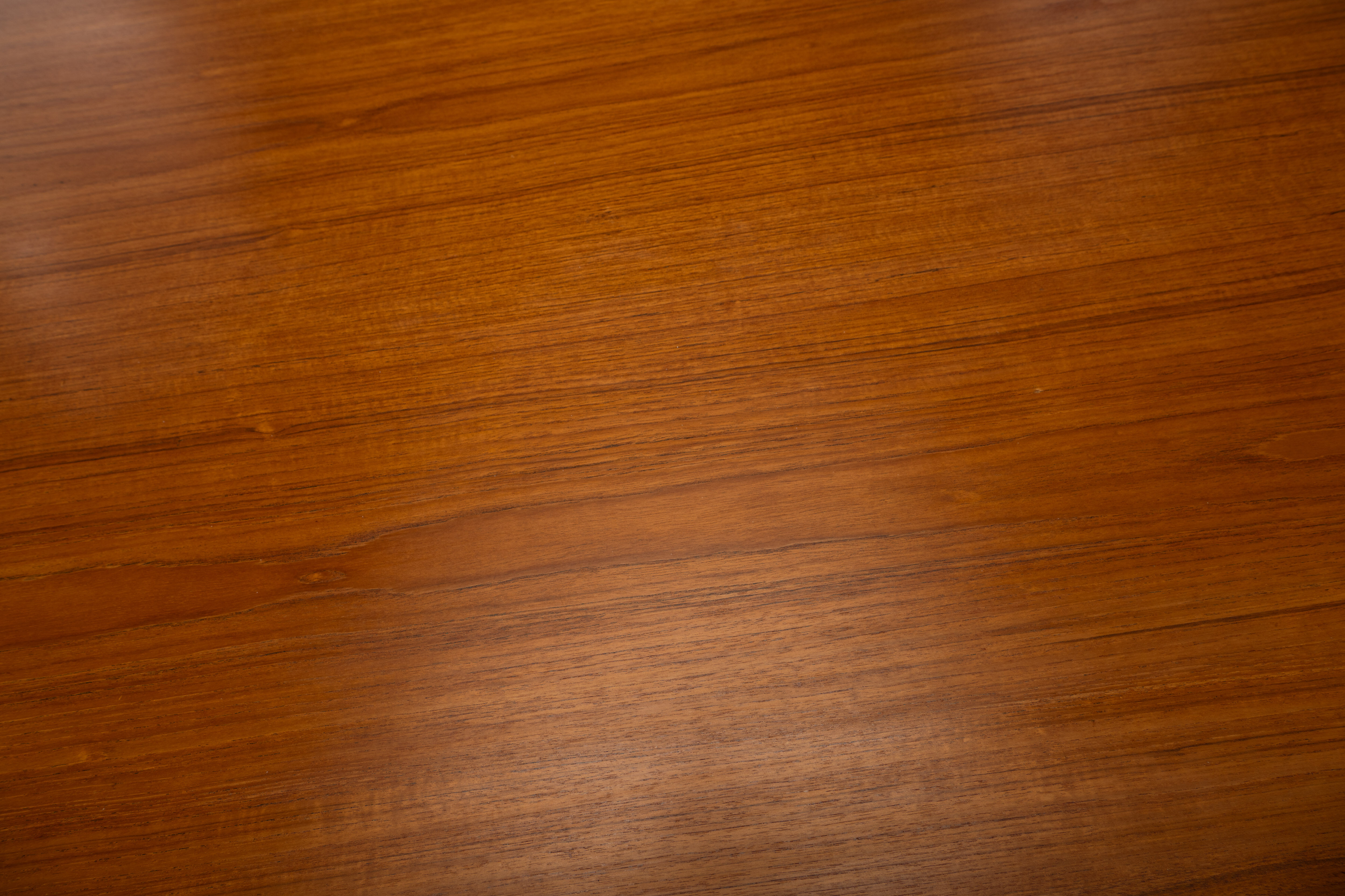 Extendable dining table in teak by Johannes Andersen for Uldum Møbelfabrik