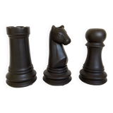 Trio of chess game candlesticks, rook, knight, pawn
