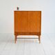 Elm and root veneer cabinet by AB Seffle Möbelfabrik, 1950s