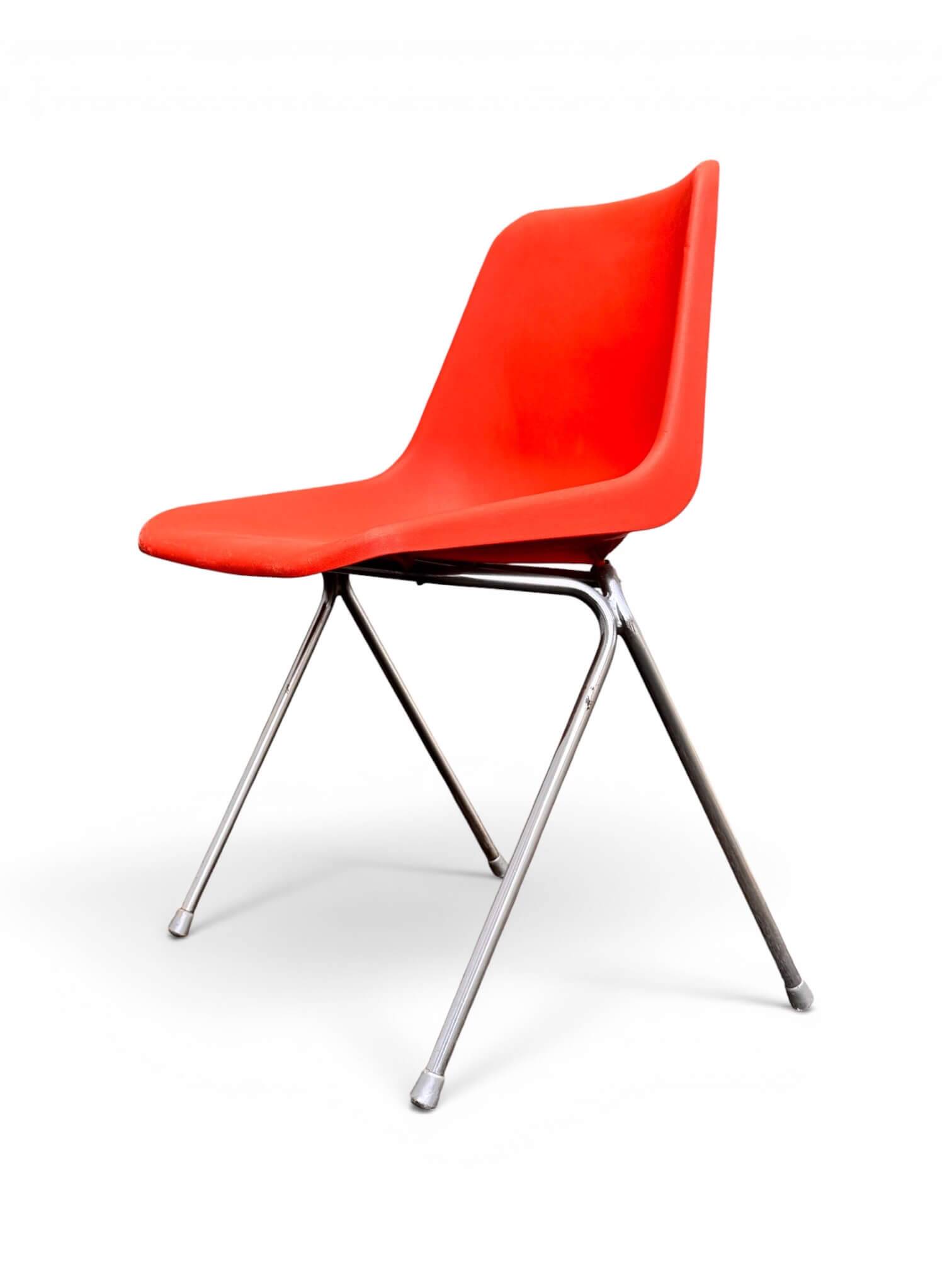 Set of 4 orange chairs designed by Robin Day for Hille.