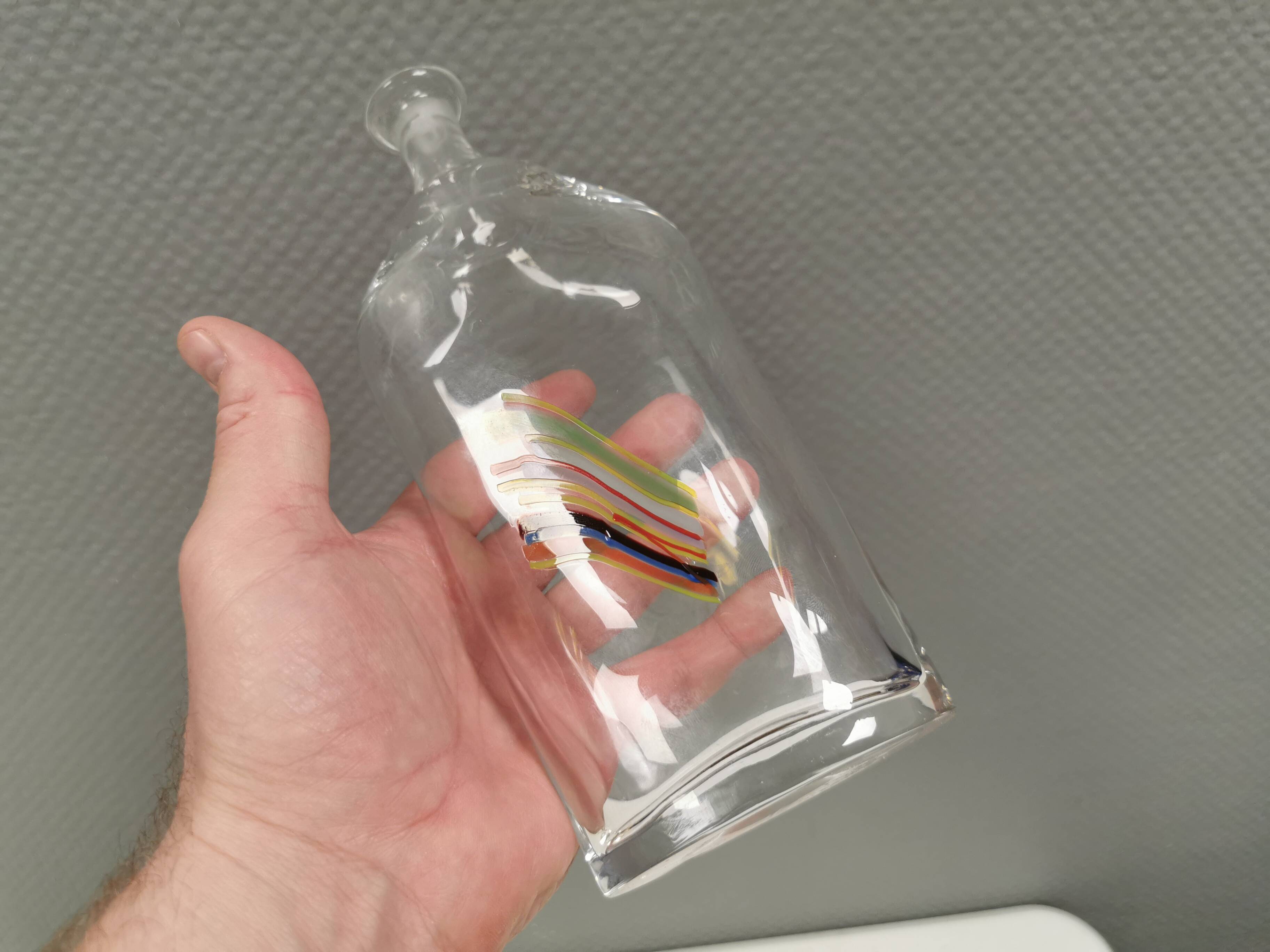 A  Bertil Vallien carafe with stopper for Kosta Boda, 1980s. Rainbow series