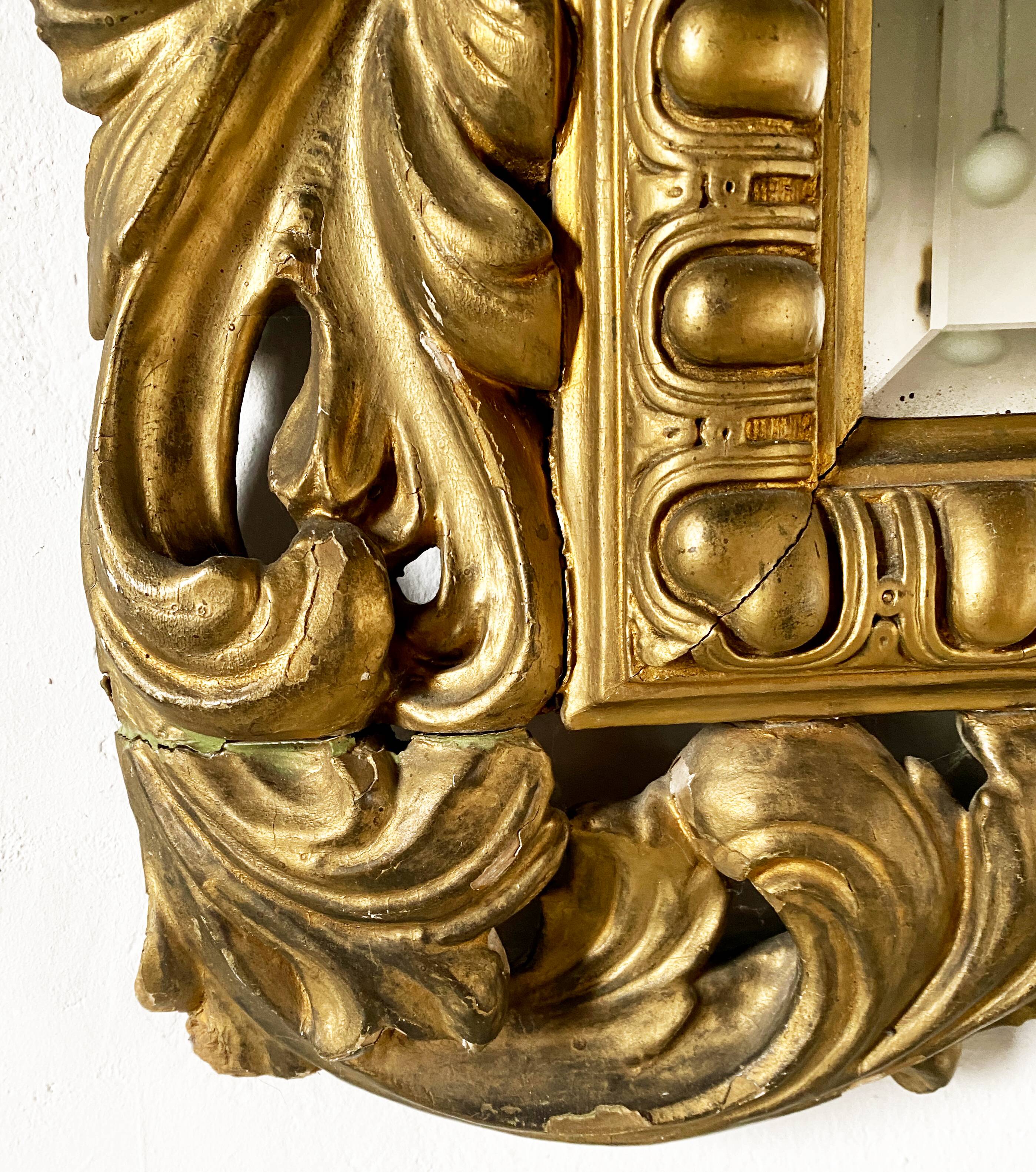 Ancient Florentine mirror – carved and gilded wooden frame – Baroque style