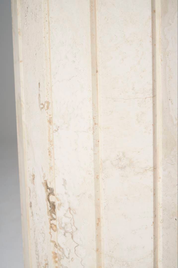 Round travertine dining table