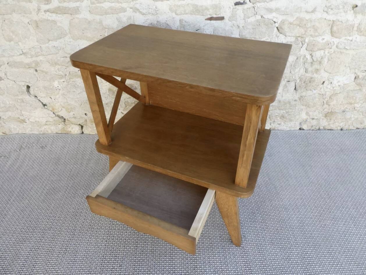 Light wood bedside table with crossbars, around 1960.