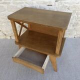 Light wood bedside table with crossbars, around 1960.