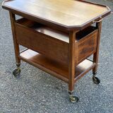Vintage retractable tea trolley on wheels