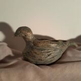 Signed bird sculpture