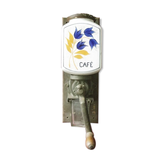 Old wall-mounted coffee grinder