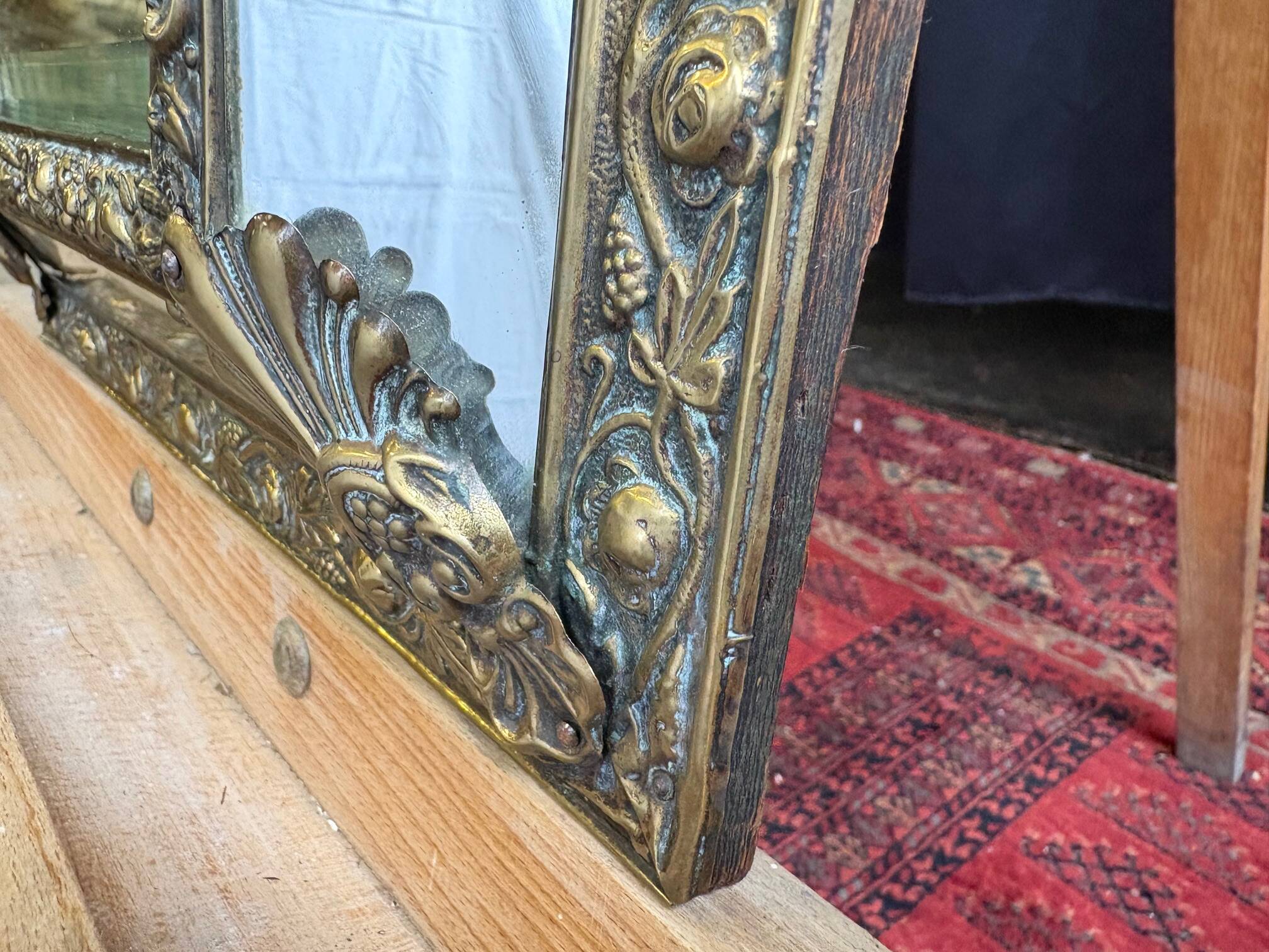Napoleon III style mirror with gilt brass side panels