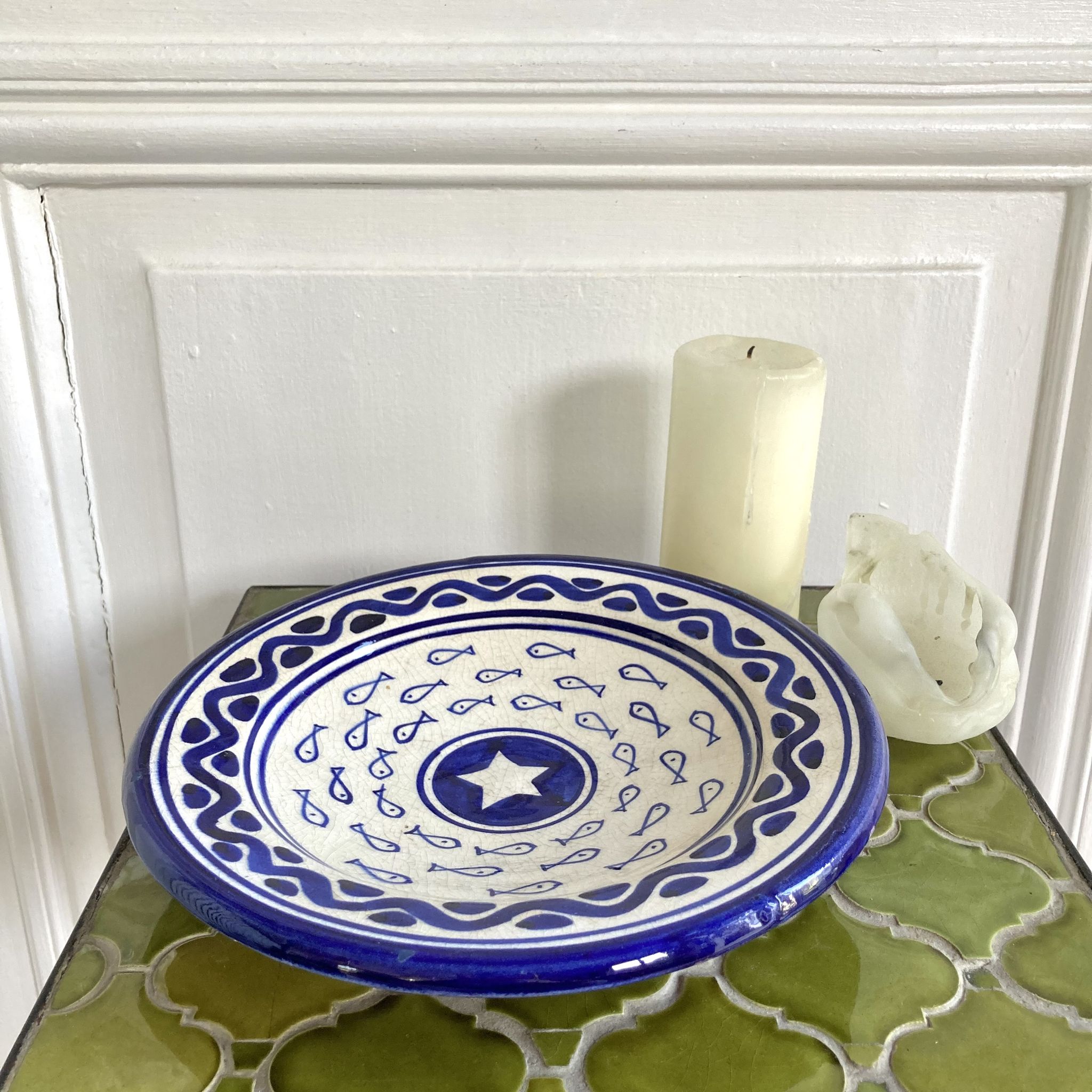 Decorative ceramic deep plate with fish decoration