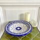 Decorative ceramic deep plate with fish decoration