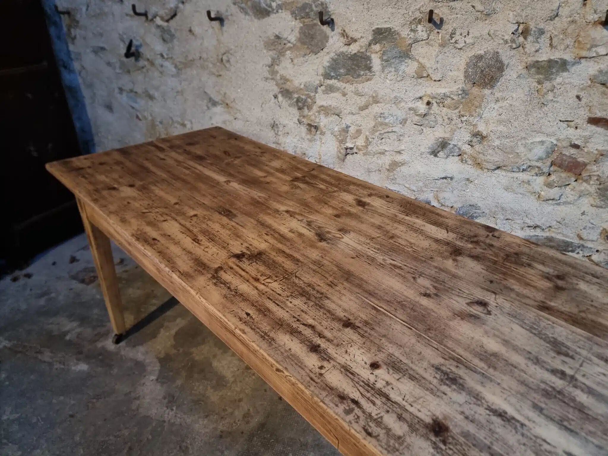 Antique French pine dining table, large farmhouse table on wheels, 19th century.