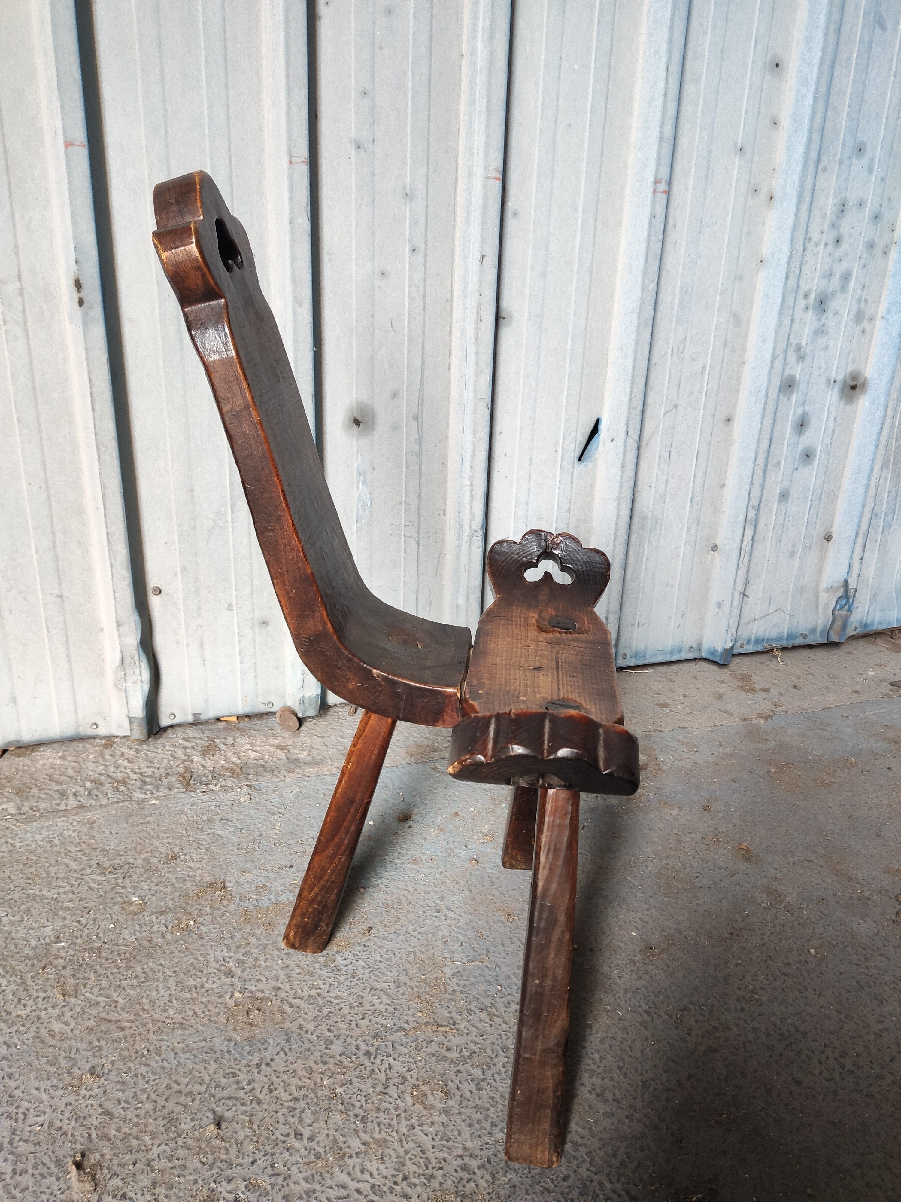 Brutalist tripod chair in solid wood