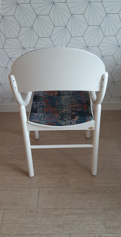 White Baumann chair.