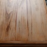 Antique wooden desk with a patinated base