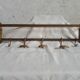 old brass wall coat rack