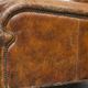 Charming and comfortable vintage armchair in grained cowhide leather with character