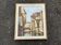 Antique painting – Medieval village scene by the water, signed