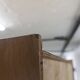 1950s Mid-Century Modern oak armoire with two doors and two drawers.