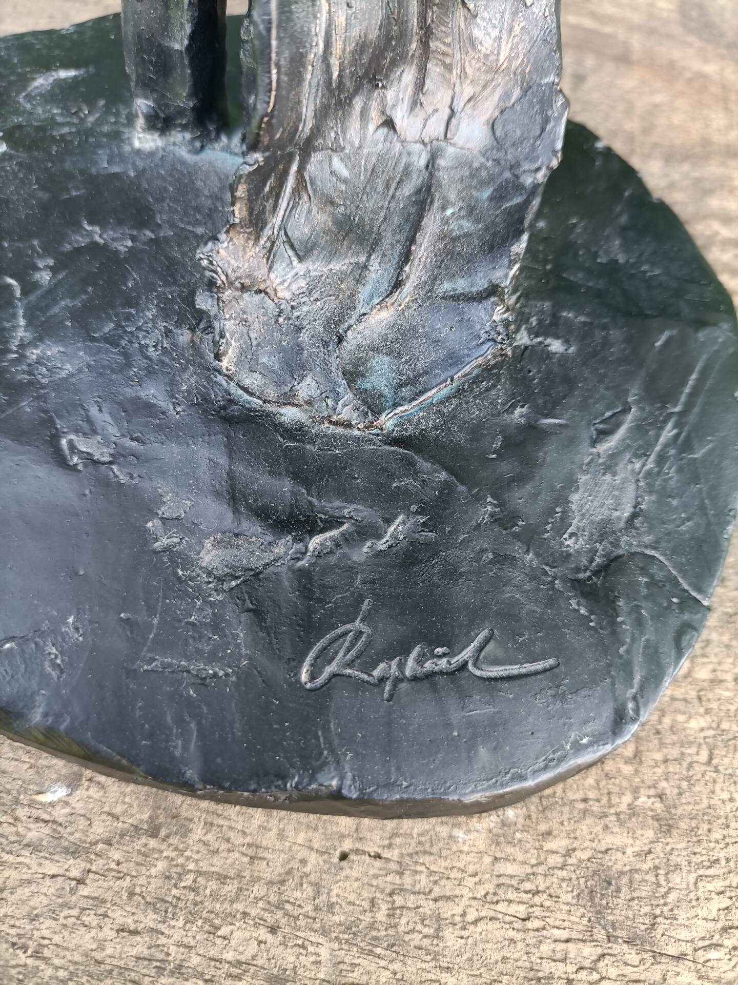 Sculpture of a dancer on a swing signed by Raphaël