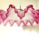 Pink draped suspension