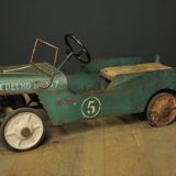 Green metal pedal car