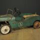 Green metal pedal car
