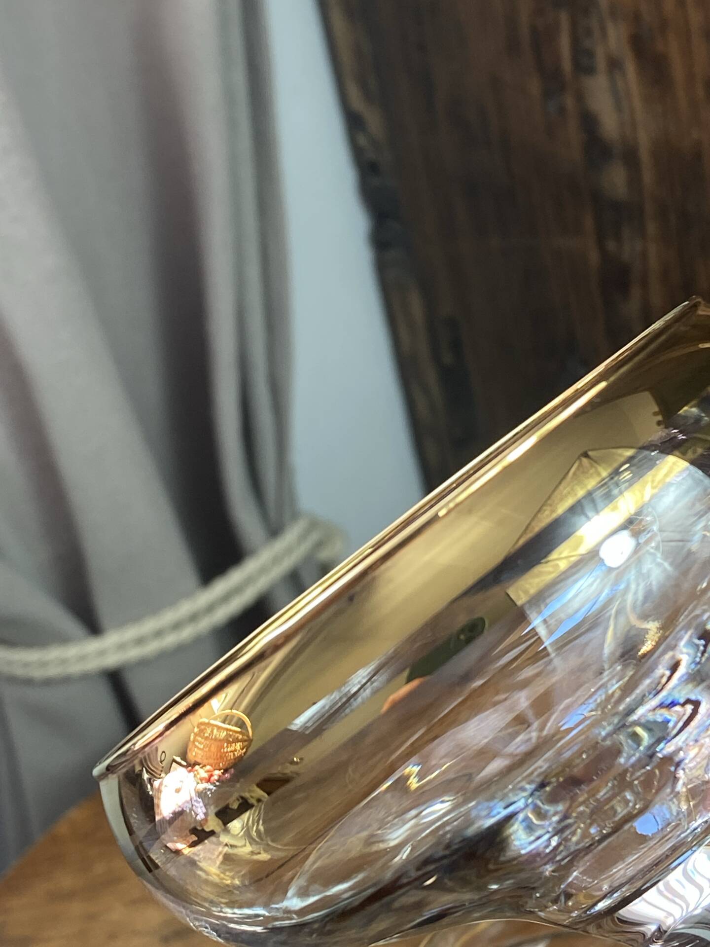 Champagne coupes or cocktail glasses with gilding