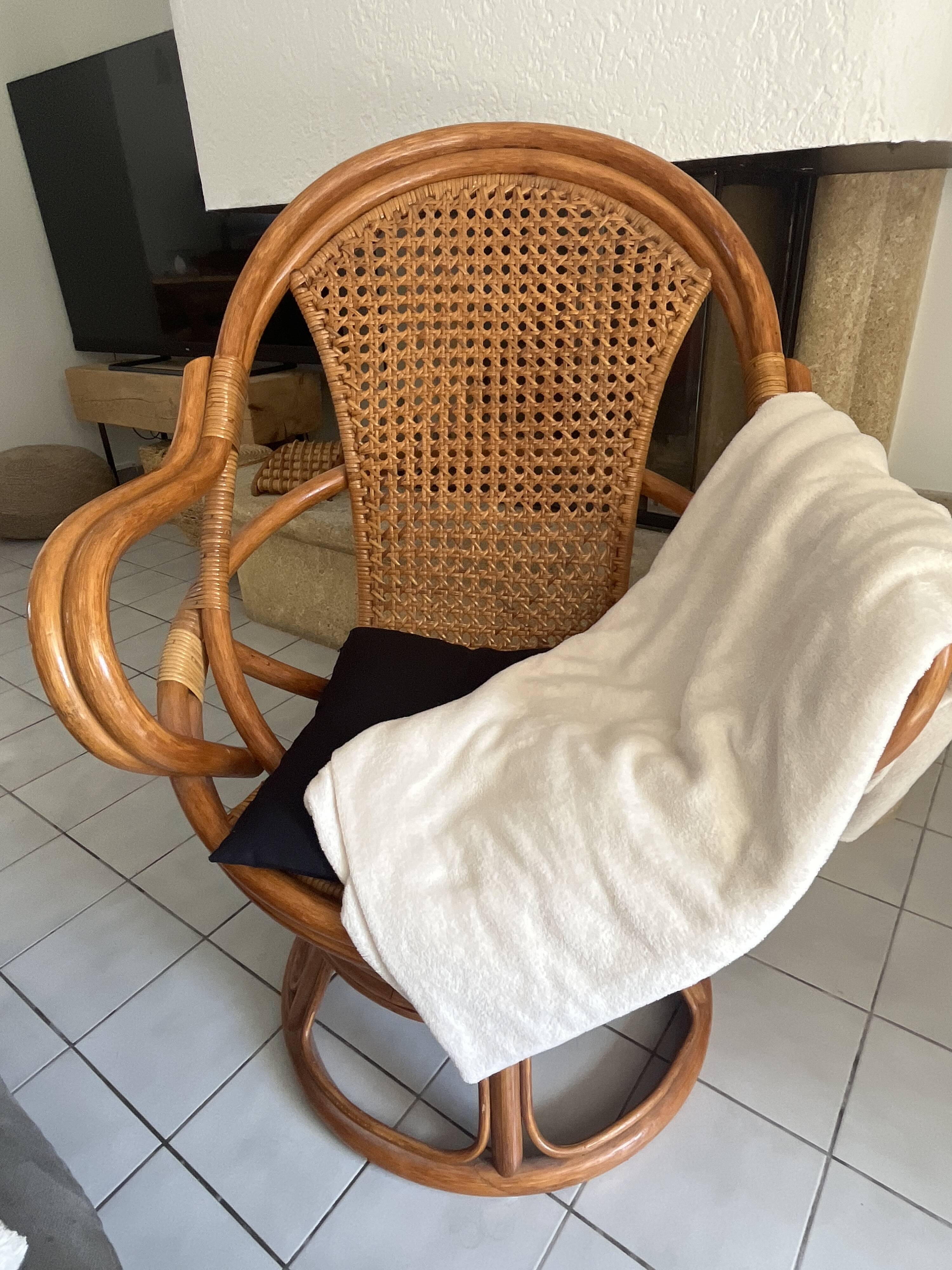 Vintage rattan and cane swivel armchair (1970s/80s) -