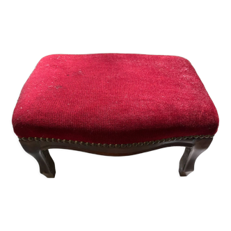 Wooden footrest and red velvet