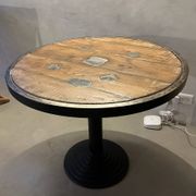 Antique bistro/atelier round table – wooden top with metal rim – foot