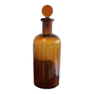 Small amber glass bottle