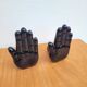 Pair of vintage black ceramic hand bookends