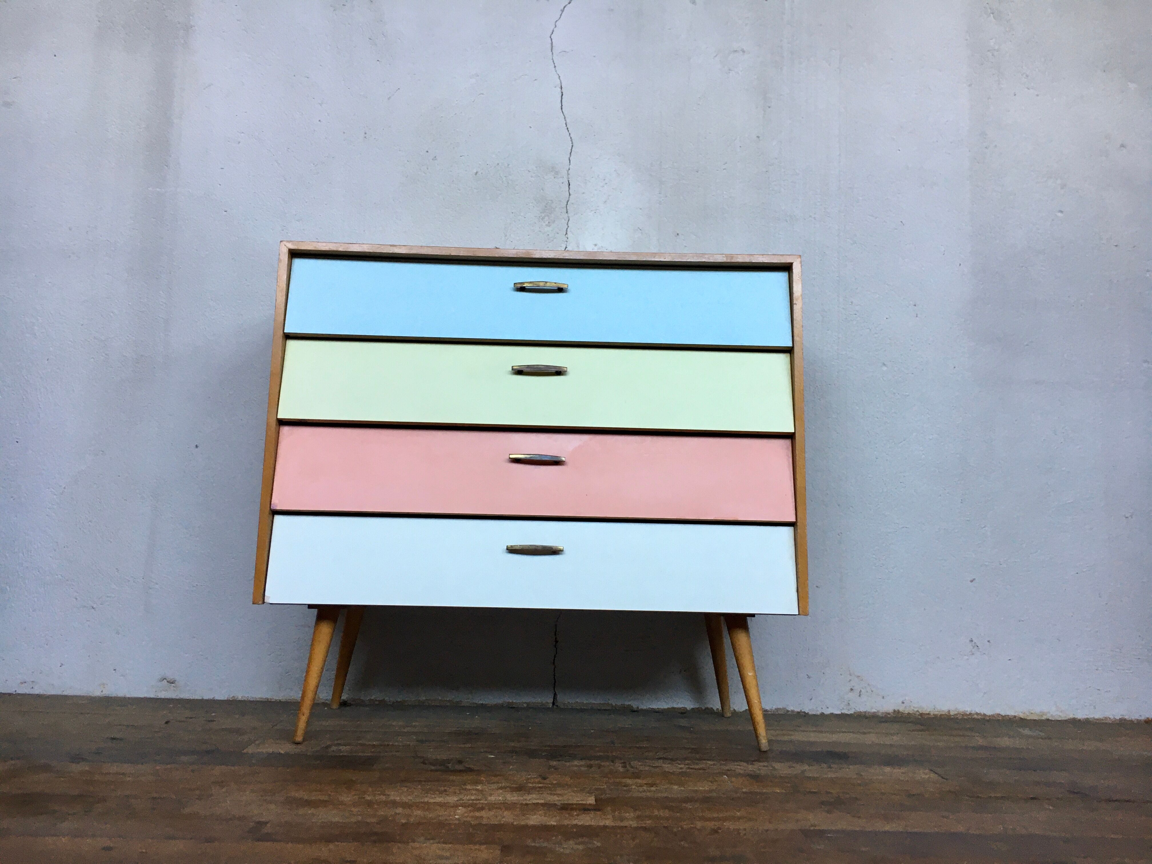 50s color formica shoe cabinet with compass feet