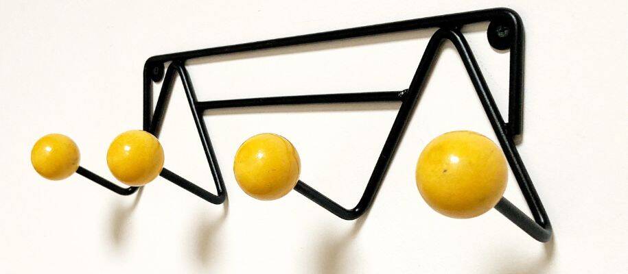 Vintage coat rack Roger Feraud with 4 yellow ball hooks.