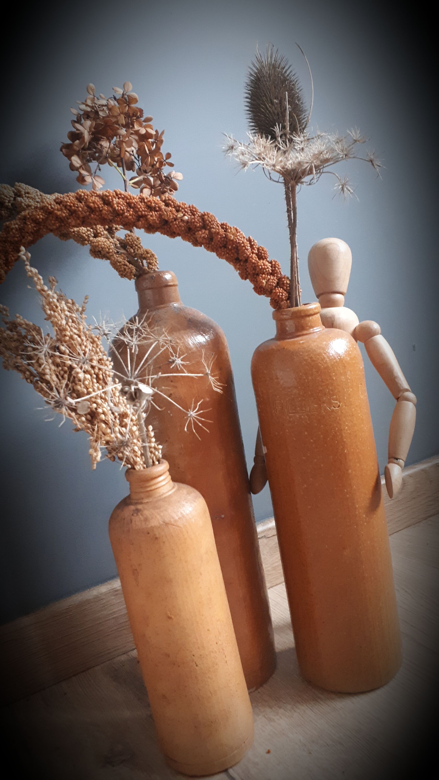 Trio of sandstone bottles 3