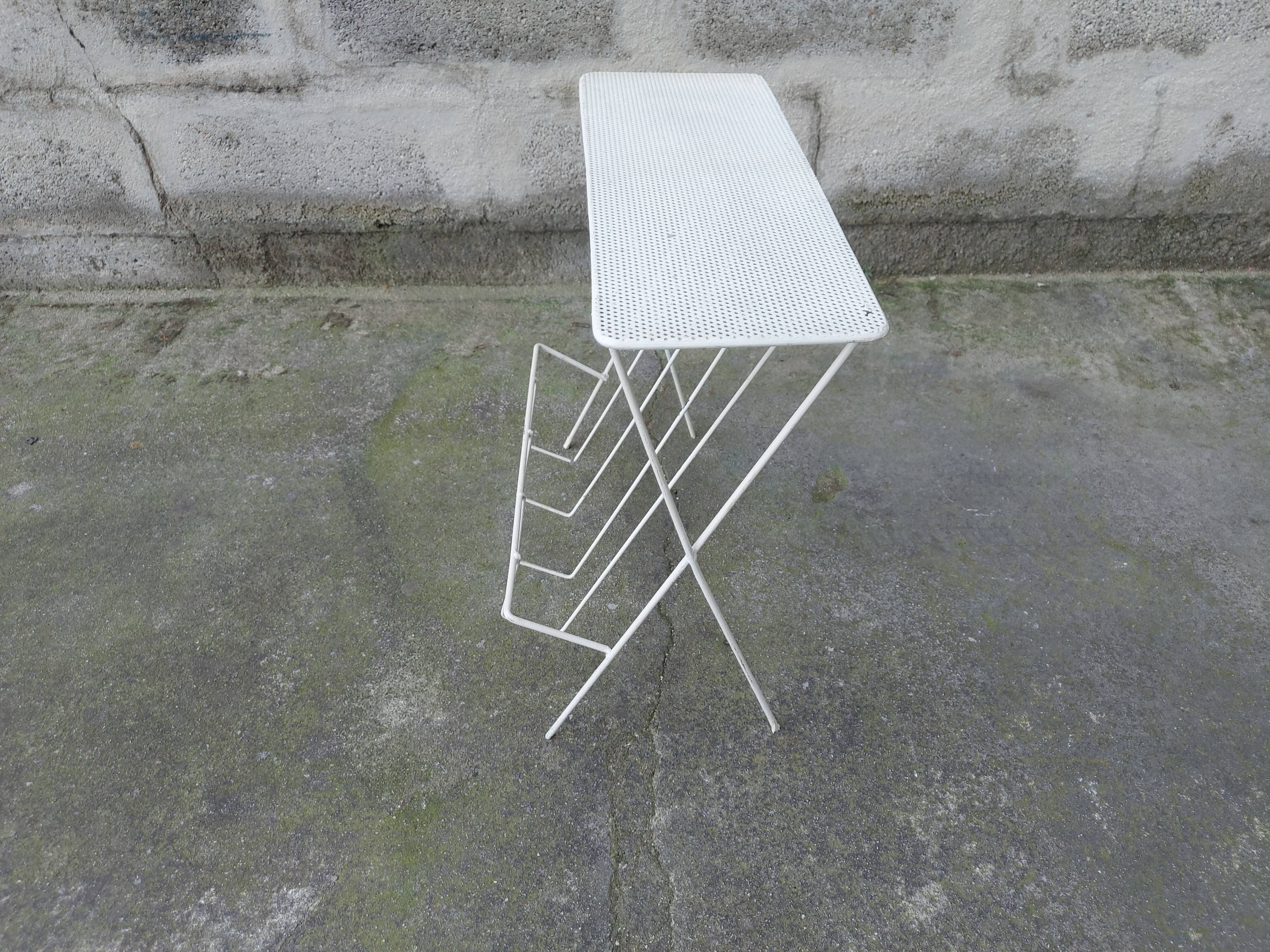 Vintage magazine holder in perforated metal