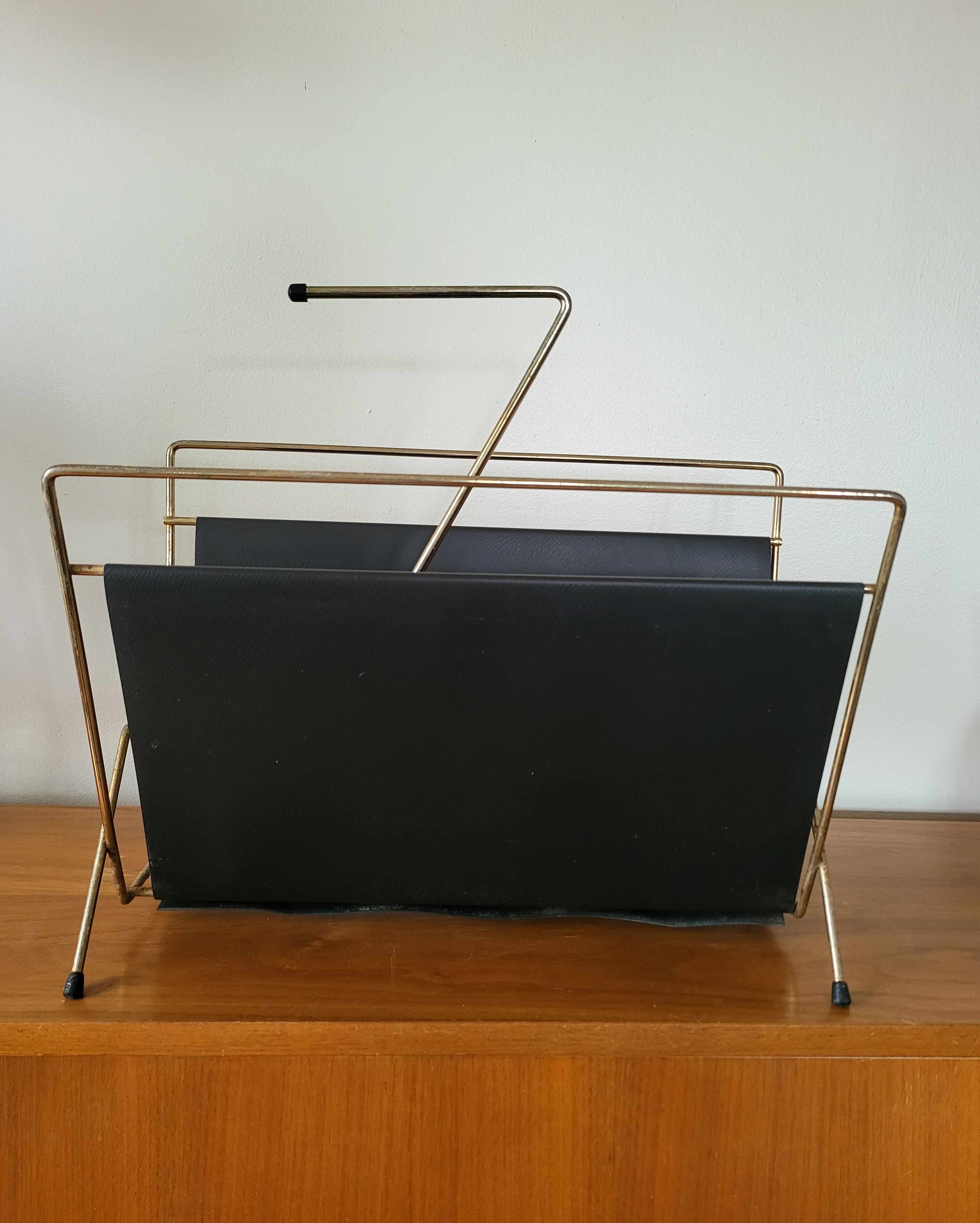 Vintage metal magazine rack in gold and black vinyl Newspaper holder