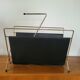 Vintage metal magazine rack in gold and black vinyl Newspaper holder