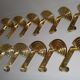 1 out of 10 pcs. Postmodern italian designer sottsass brass wall coat hooks