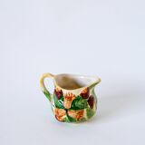 Tea service consisting of a teapot, a milk jug and a numbered hazelnut slip sugar bowl