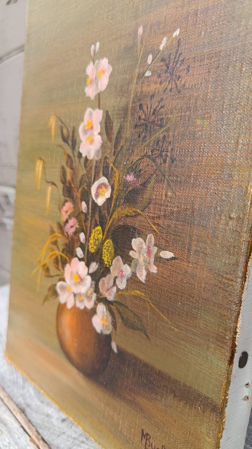 Canvas painting of a bouquet of flowers.