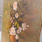 Canvas painting of a bouquet of flowers.