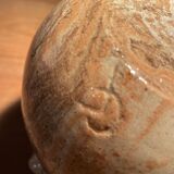 Round vase in mixed earth signed