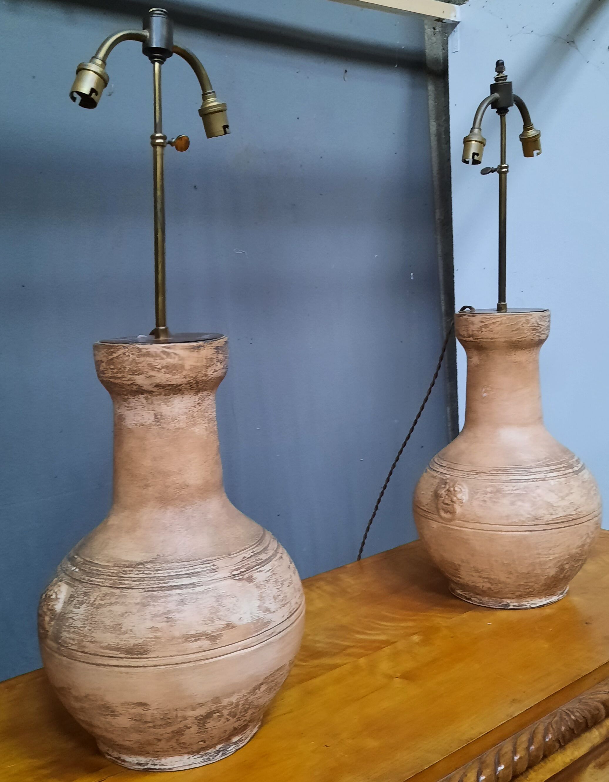 Pair of terracotta lamps