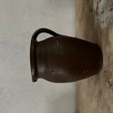 Pitcher in ancient earth