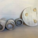 Trio of marble candle holders with stand